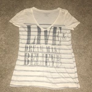 White T-shirt with gray stripes and saying